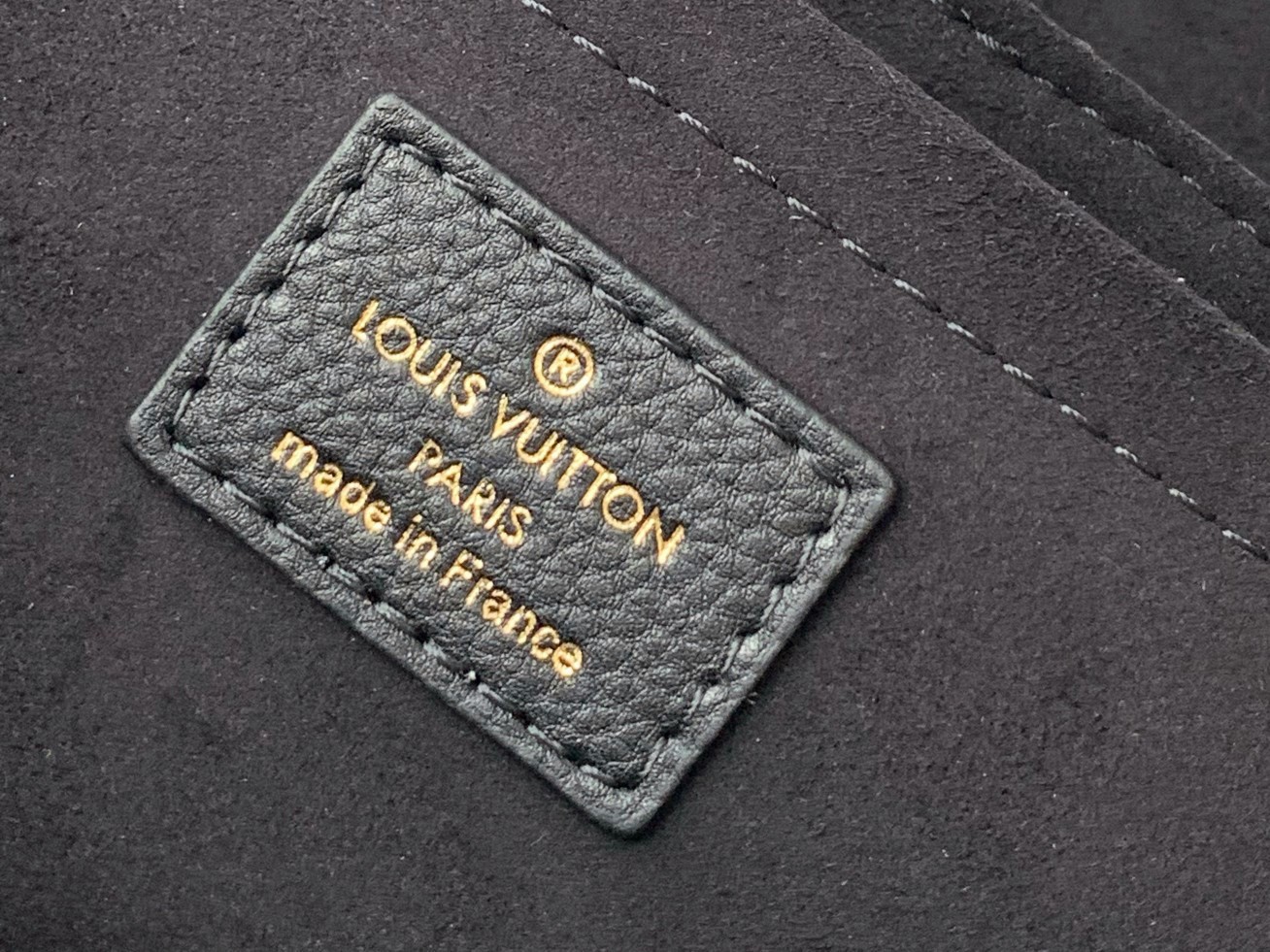 Replica Louis Vuitton LockMe East West Chain Bag M22303