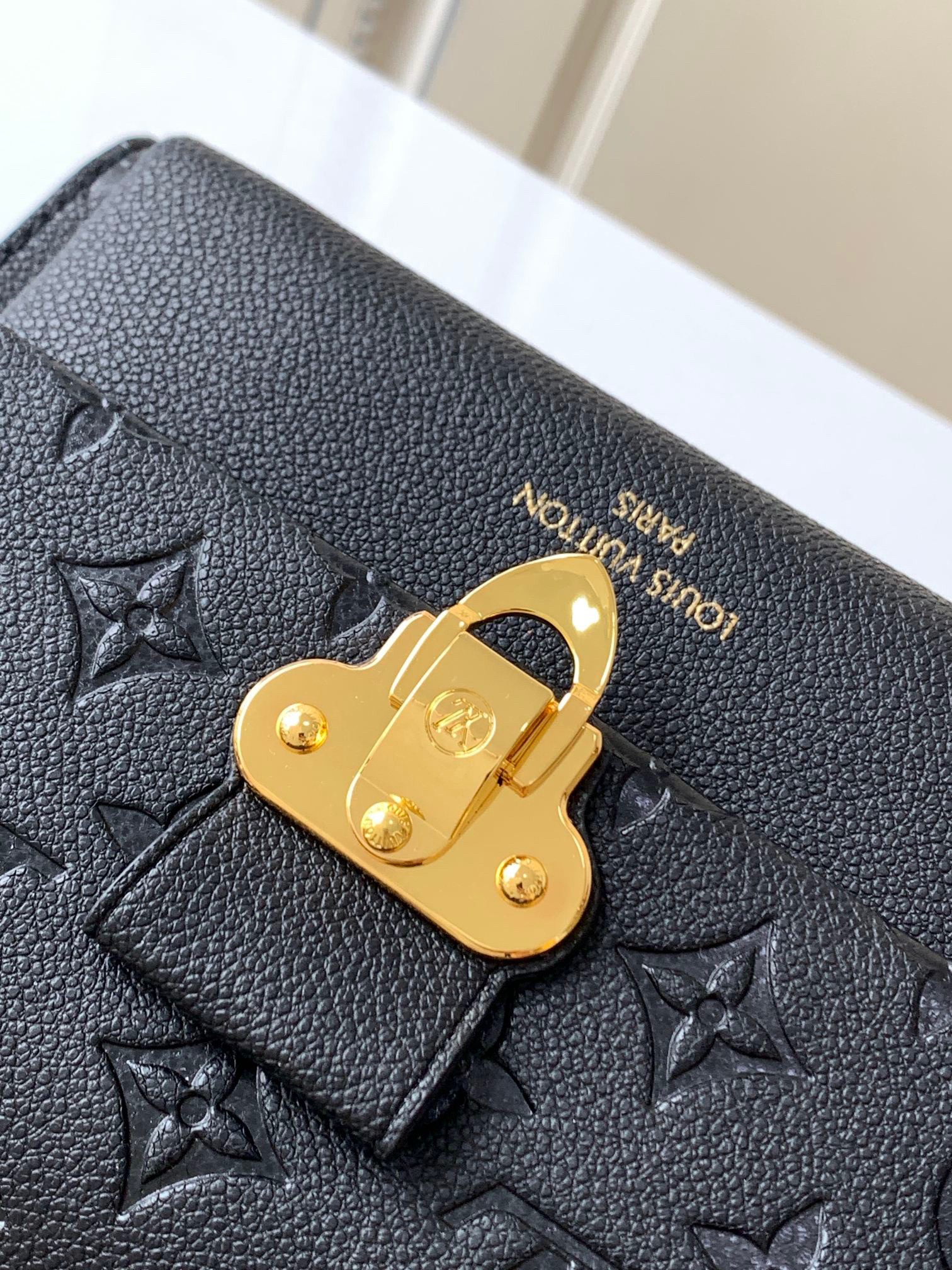 Shop Louis Vuitton MONOGRAM EMPREINTE Victorine wallet (M64060