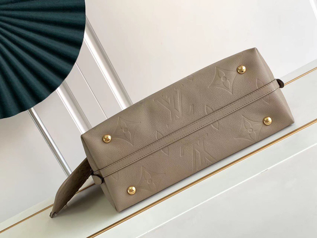 Replica Louis Vuitton CarryAll MM Bag In Monogram Empreinte Leather M46292