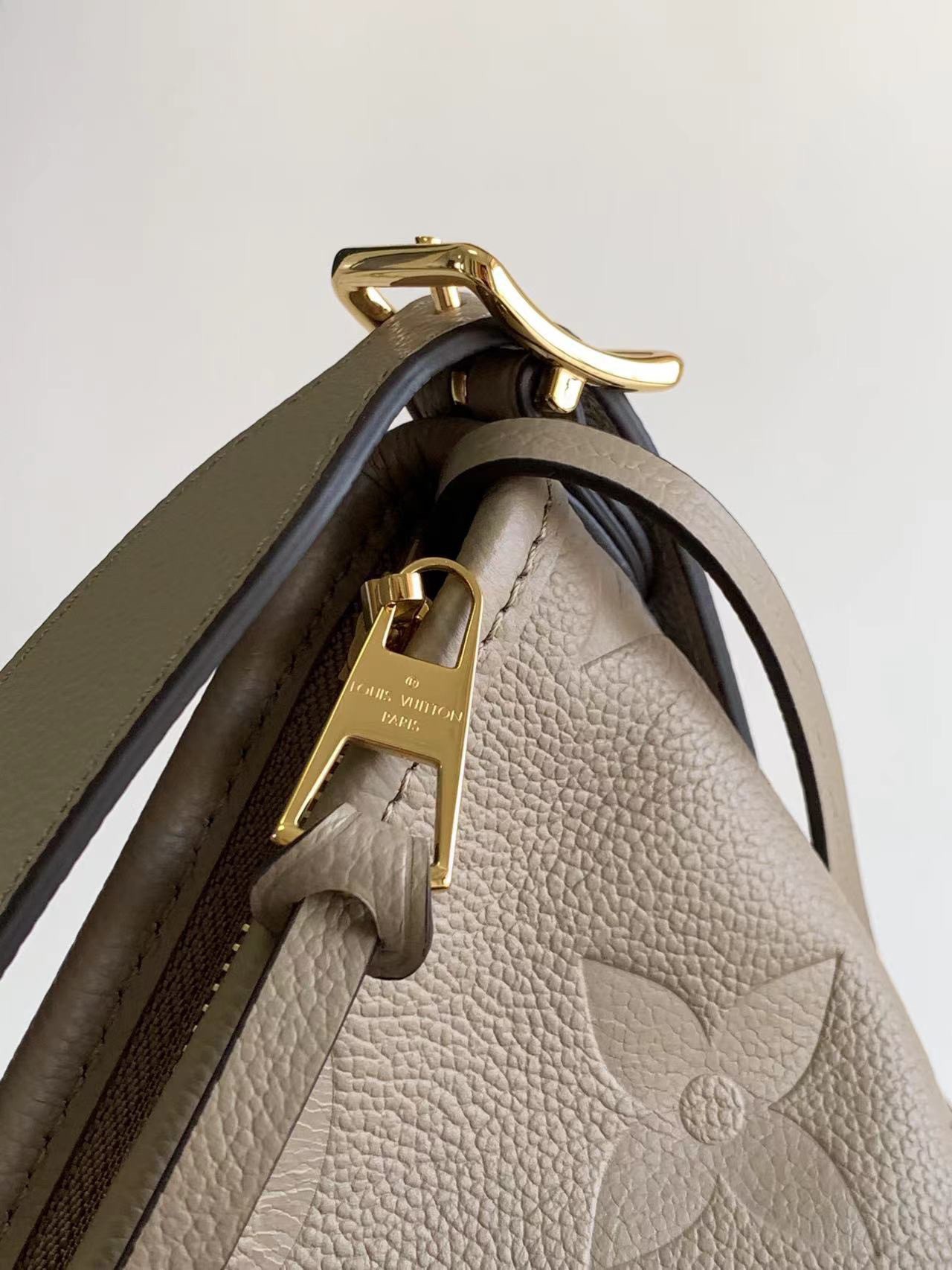 Replica Louis Vuitton CarryAll MM Bag In Monogram Empreinte Leather M46292